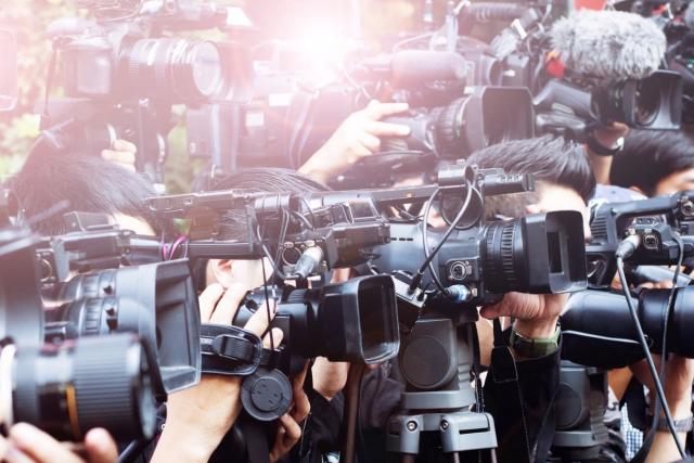 a photo of news media cameras