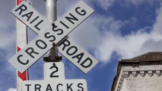 photo of a railroad crossing sign