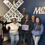 people in front of sign