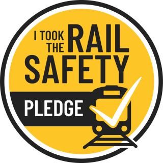 a badge that says I took the rail safety pledge