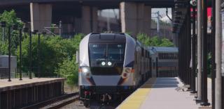 a transit train coming in to the platform